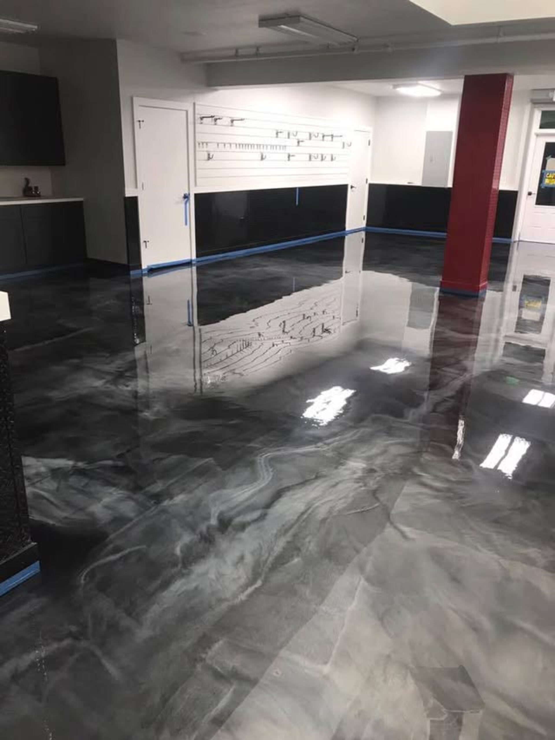 Metallic epoxy floor installation by Lord Epoxy Coatings